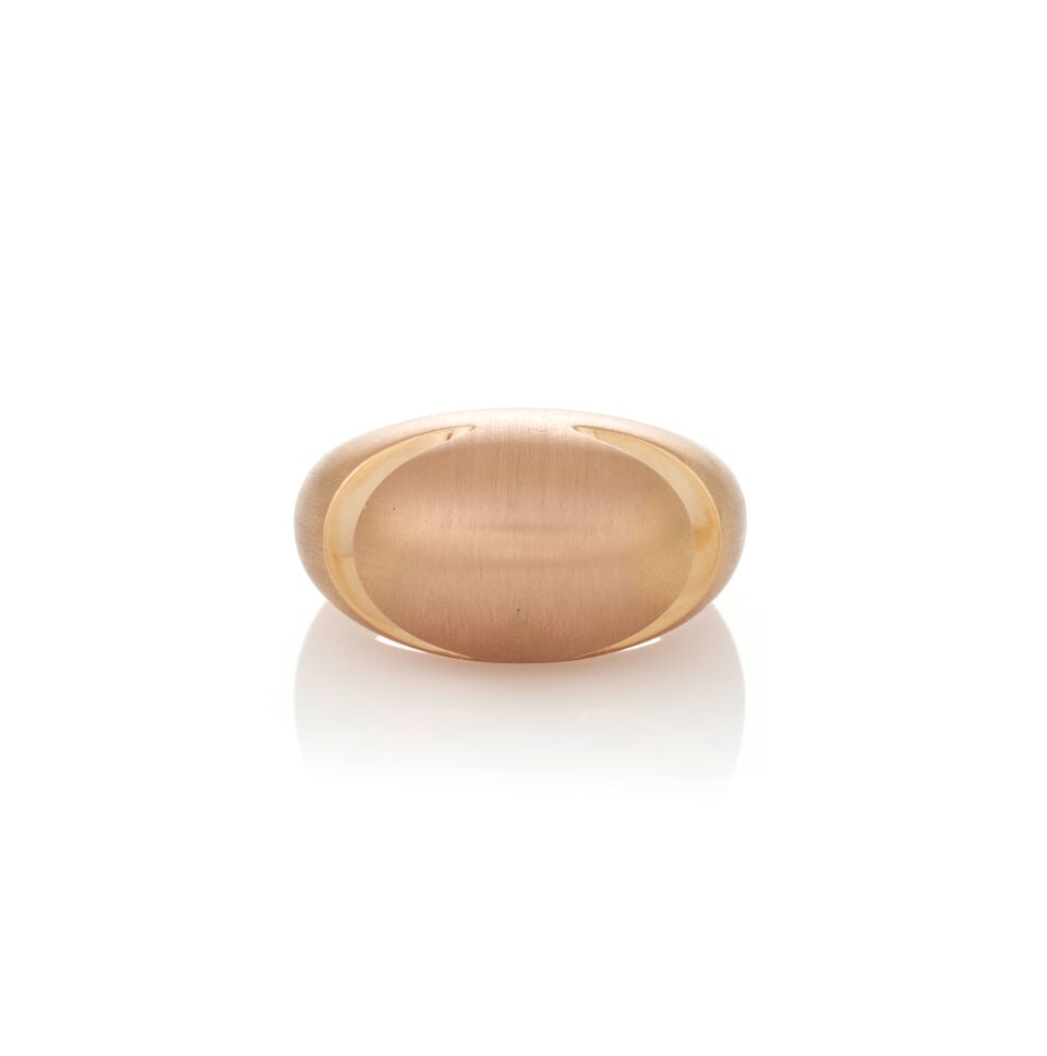 BULGARI: AN 18K ROSE GOLD 'CABOCHON' RING, ITALY: BULGARI: AN 18K ROSE GOLD 'CABOCHON' RING, ITALY In a brushed gold finish, weight 8.2 dwt, signed Bulgari, approximately size 9 1/4. For further information on this lot please visit