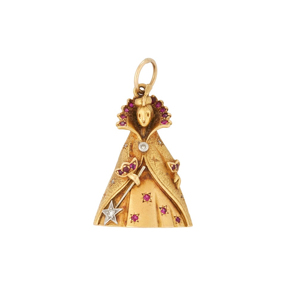 A CHARMING 18K GOLD, RUBY, AND DIAMOND BELL PENDANT, FRANCE: A CHARMING 18K GOLD, RUBY, AND DIAMOND BELL PENDANT, FRANCE Designed as a fairy godmother with star shaped wand, set with circular-cut rubies and single-cut diamonds, on an associated 14k gold,