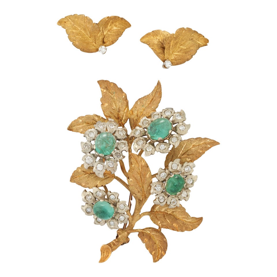 SPRITZER & FUHRMANN: AN 18K GOLD, EMERALD, AND DIAMOND SUITE: SPRITZER & FUHRMANN: AN 18K GOLD, EMERALD, AND DIAMOND SUITE Comprising a brooch designed as a floral spray set with oval cabochon emeralds framed by full and single-cut diamond petals, and a pair of