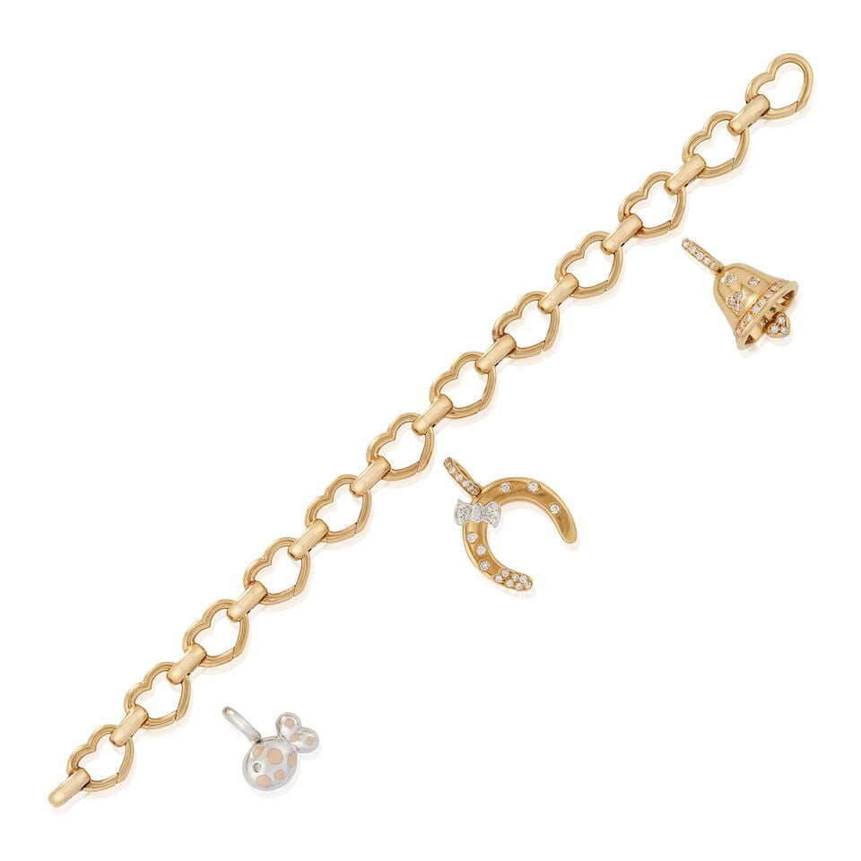 AARON BASHA: AN 18K GOLD BRACELET AND CHARMS: AARON BASHA: AN 18K GOLD BRACELET AND CHARMS The bracelet composed of heart shaped links, together with three charms, two set with full-cut diamonds, weight 27.1 dwt, each signed Aaron Basha, the