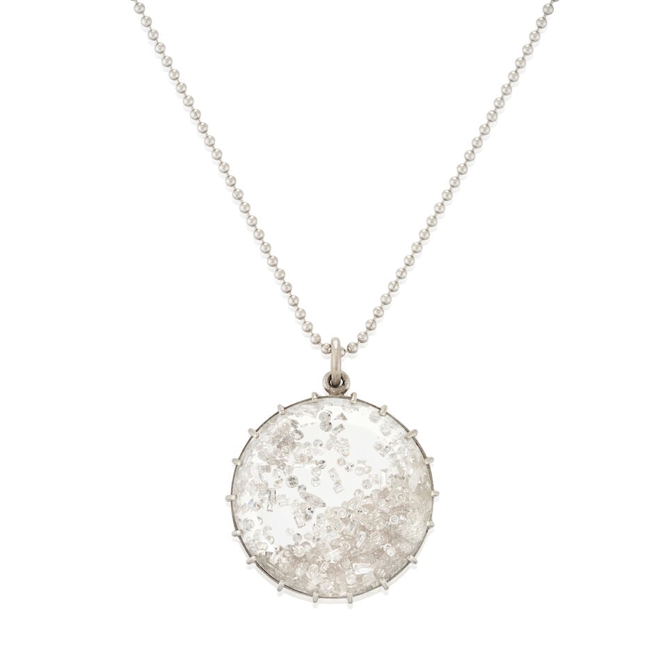 RENEE LEWIS: AN 18K WHITE GOLD AND DIAMOND 'SHAKE' PENDANT NECKLACE: RENEE LEWIS: AN 18K WHITE GOLD AND DIAMOND 'SHAKE' PENDANT NECKLACE The pendant enclosing single, marquise, and baguette-cut diamonds, suspended from a white gold chain, weight 7.1 dwt, signed Renee