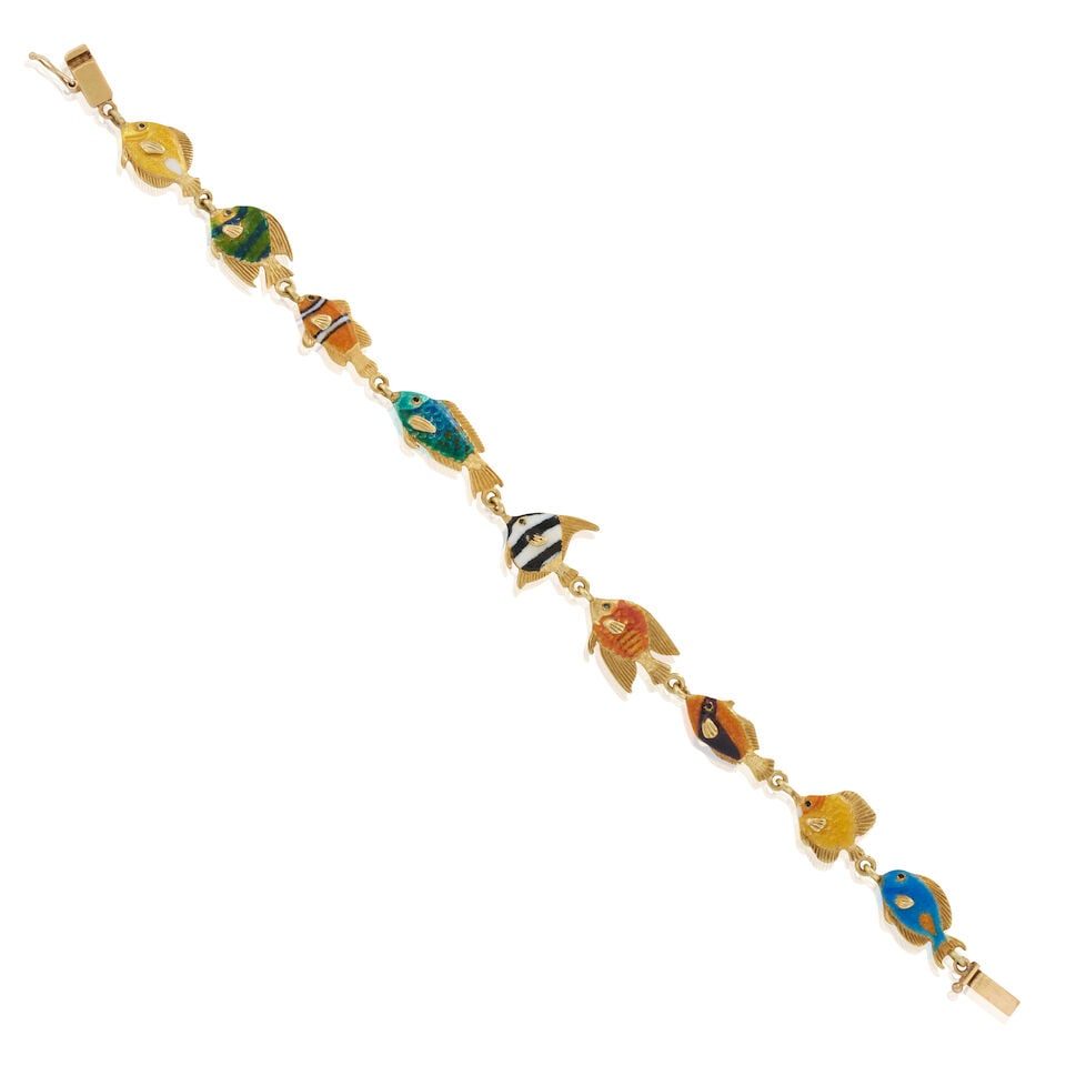 KABANA: AN 18K GOLD AND ENAMEL FISH BRACELET: KABANA: AN 18K GOLD AND ENAMEL FISH BRACELET The links designed as fish in multicolored enamel, weight 11.1 dwt, signed Kabana, 7 15/16 in. For further information on this lot please visit