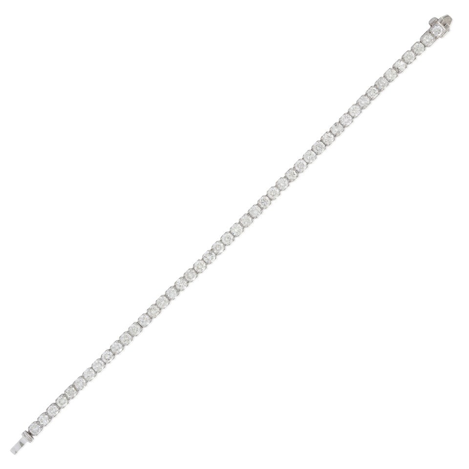 A 14K WHITE GOLD AND DIAMOND BRACELET (1 of 4)