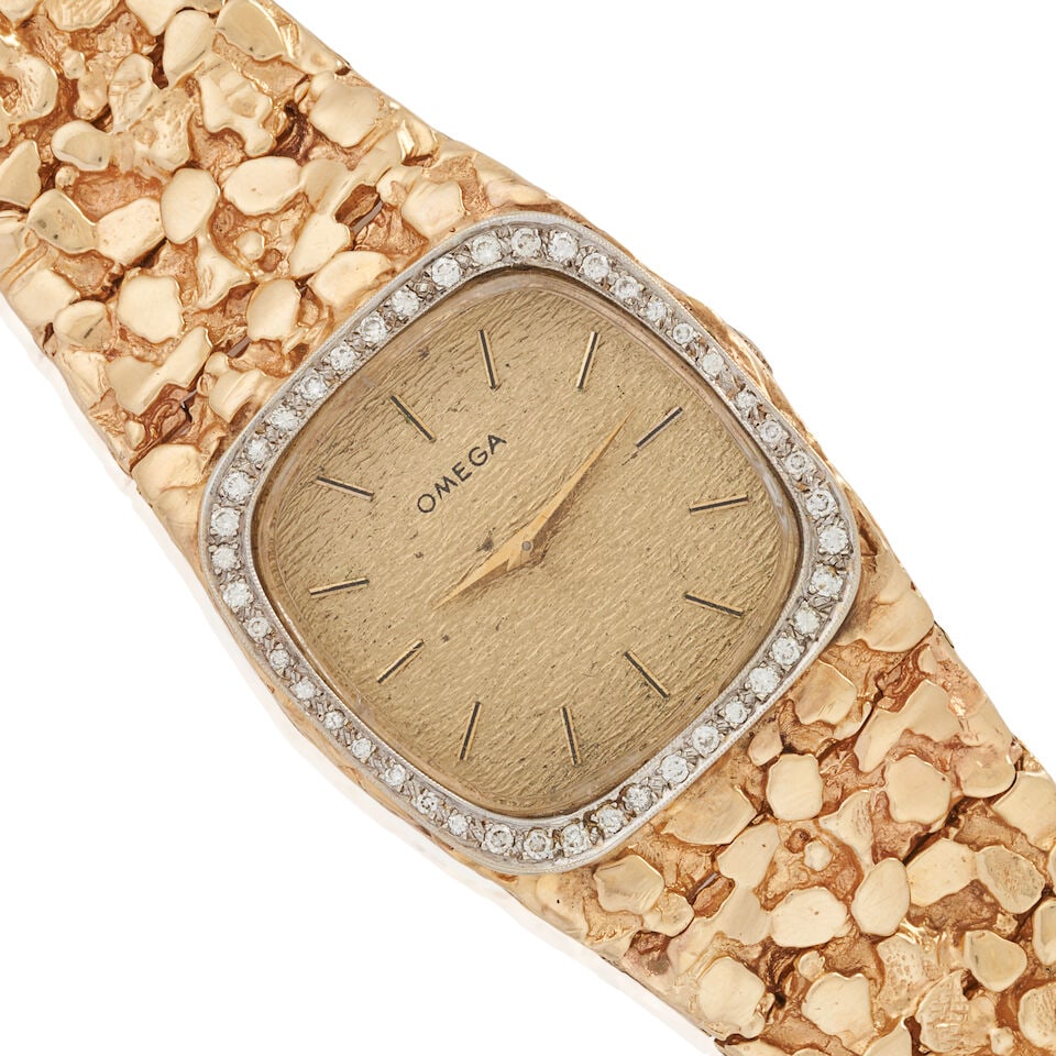 OMEGA: A 14K GOLD AND DIAMOND WRISTWATCH - 5