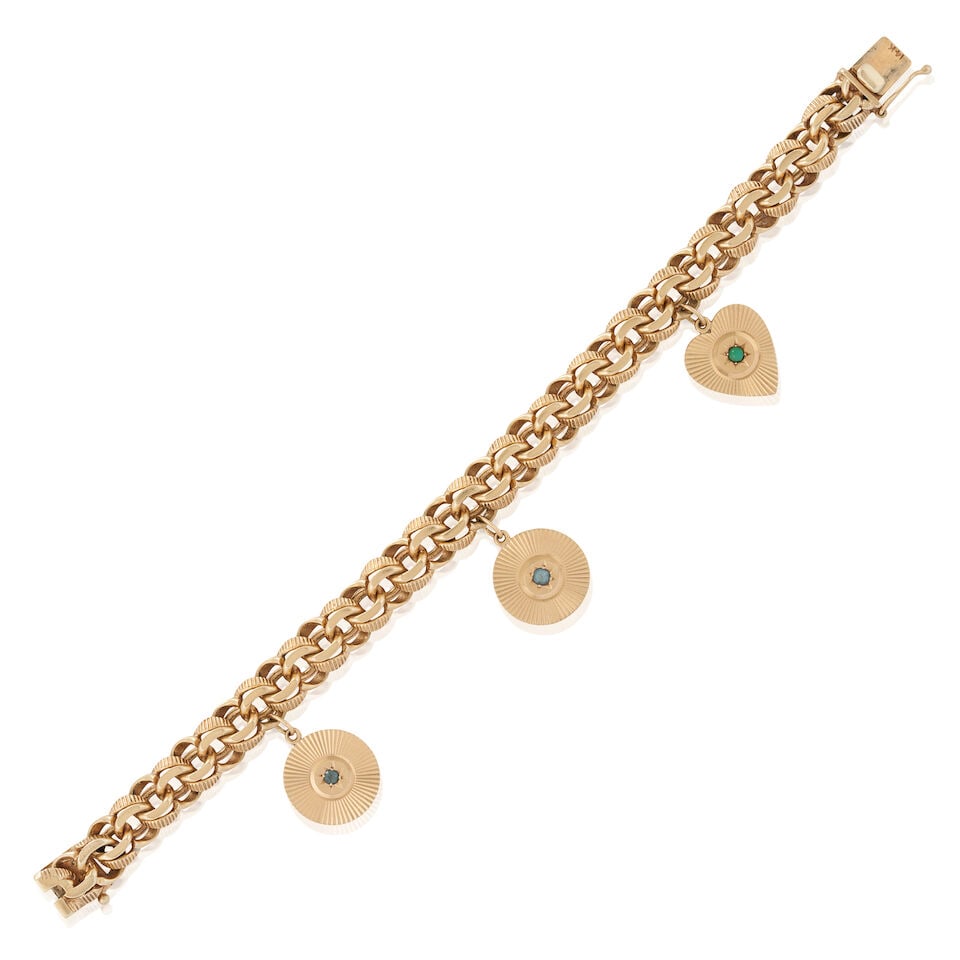 A 14K GOLD CHARM BRACELET (1 of 4)