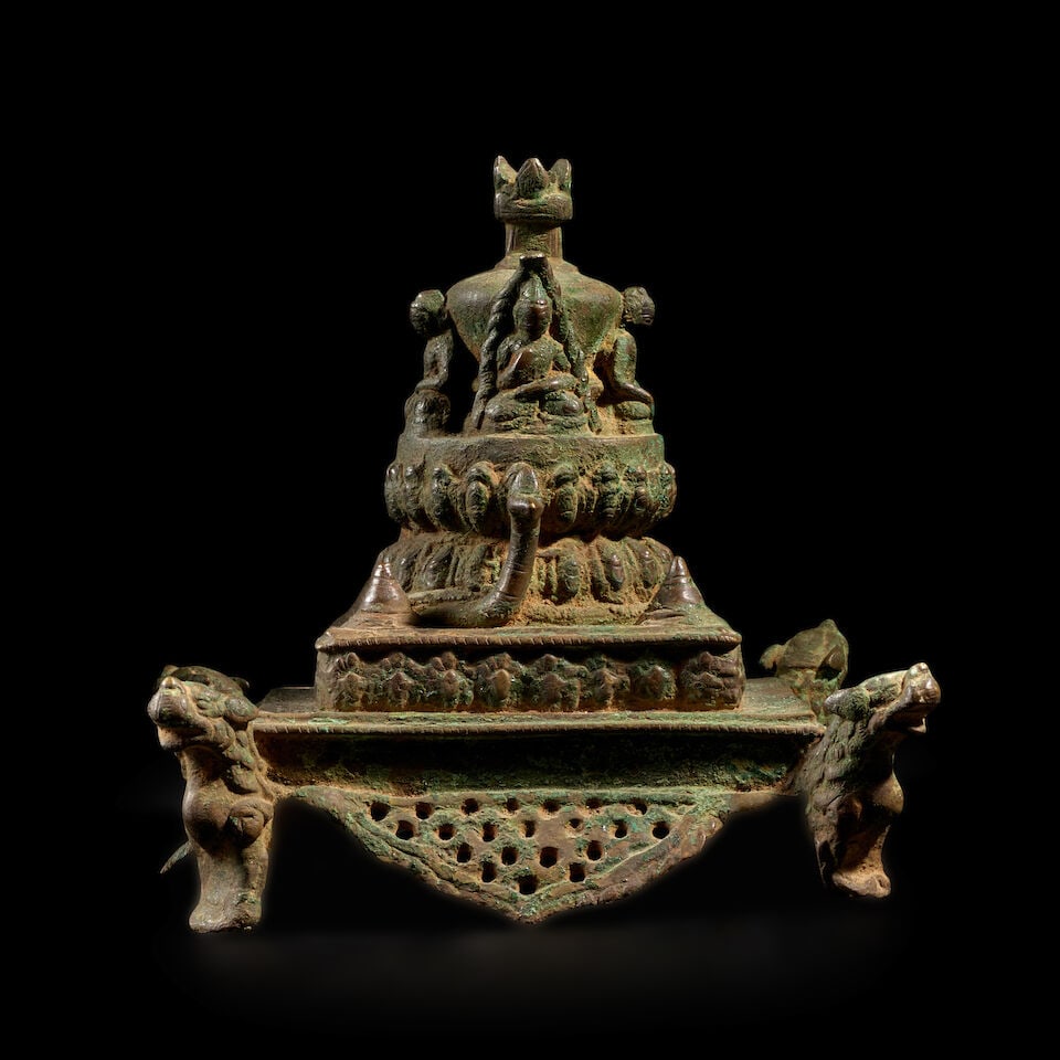 A COPPER ALLOY STUPA NEPAL, 17TH/18TH CENTURY: A COPPER ALLOY STUPA NEPAL, 17TH/18TH CENTURY 6 in. (15.2 cm) high Footnotes: 尼泊爾 十七/十八世紀 銅佛塔 Published Melissa Keri