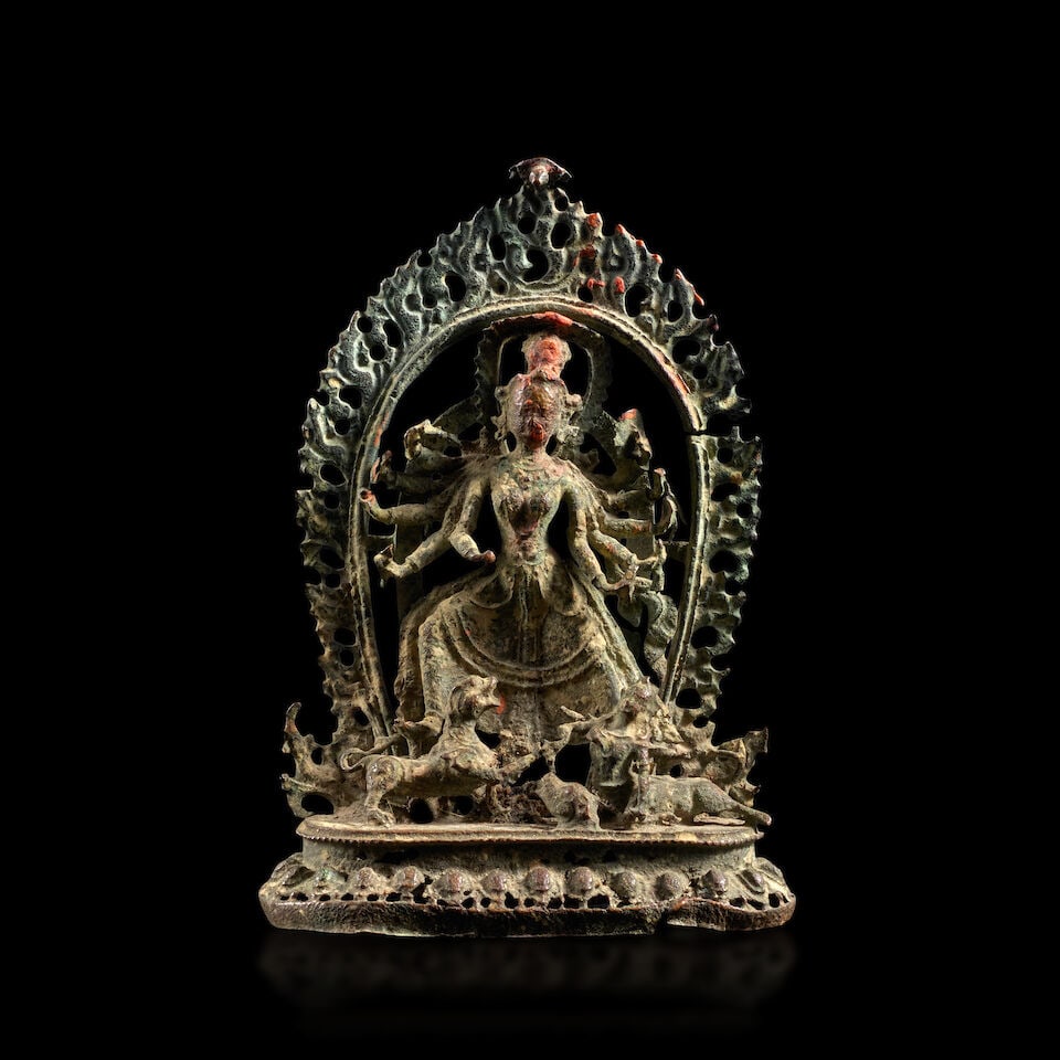 A COPPER ALLOY FIGURE OF DURGA MAHISASURAMARDINI NEPAL, 17TH/18TH CENTURY: A COPPER ALLOY FIGURE OF DURGA MAHISASURAMARDINI NEPAL, 17TH/18TH CENTURY Himalayan Art Resources item no. 8834 5 1/4 in. (13.3 cm) high Footnotes: 尼泊爾