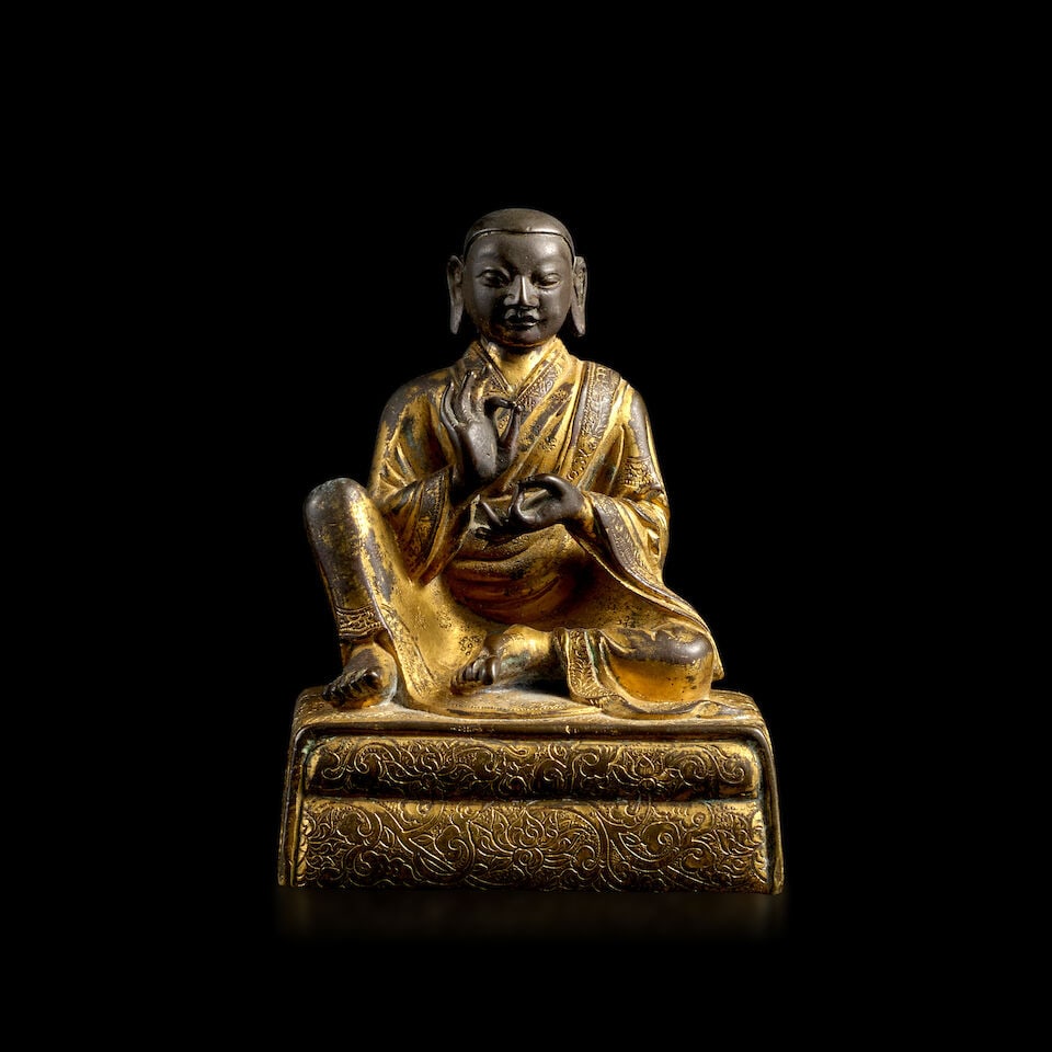 A PARCEL-GILT COPPER ALLOY FIGURE OF AN ARHAT QING, 18TH CENTURY: A PARCEL-GILT COPPER ALLOY FIGURE OF AN ARHAT QING, 18TH CENTURY Himalayan Art Resources item no. 8811 3 3/4 in. (9.5 cm) high Footnotes: 清 十八世紀