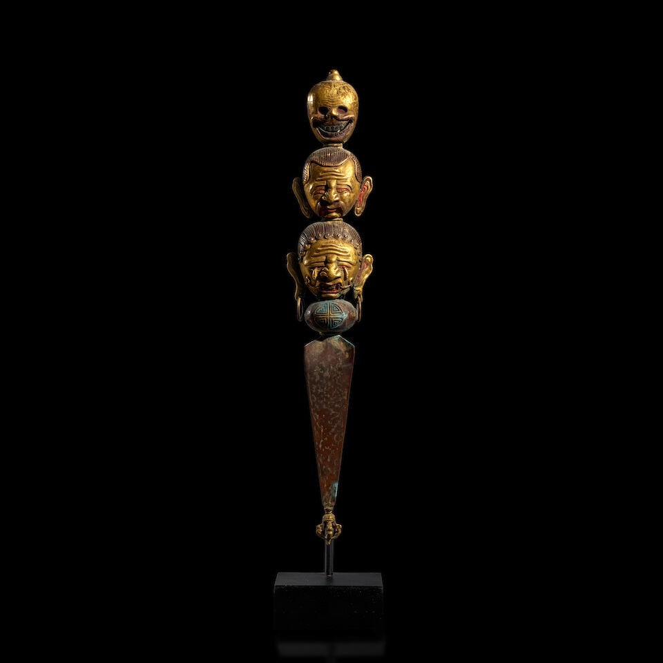 A GILT COPPER ALLOY REPOUSSE TANTRIC STAVE MONGOLIA, 19TH/20TH CENTURY: A GILT COPPER ALLOY REPOUSSE TANTRIC STAVE MONGOLIA, 19TH/20TH CENTURY Himalayan Art Resources Item no. 90359 22 1/2 in. (57.15 cm high) Footnotes: 蒙古