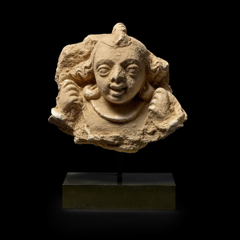 A STUCCO FIGURE OF A MALE ADORANT ANCIENT REGION OF GANDHARA, CIRCA 4TH CENTURY: A STUCCO FIGURE OF A MALE ADORANT ANCIENT REGION OF GANDHARA, CIRCA 4TH CENTURY 6 3/4 in. (17 cm) high Footnotes: 犍陀羅 四世紀