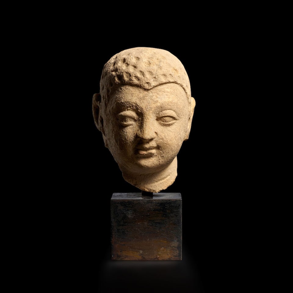 A STUCCO HEAD OF THE BUDDHA ANCIENT REGION OF GANDHARA, 3RD-5TH CENTURY: A STUCCO HEAD OF THE BUDDHA ANCIENT REGION OF GANDHARA, 3RD-5TH CENTURY 4 3/4 in. (12 cm) high Footnotes: 犍陀羅 三/五世紀 泥塑佛首 Pu