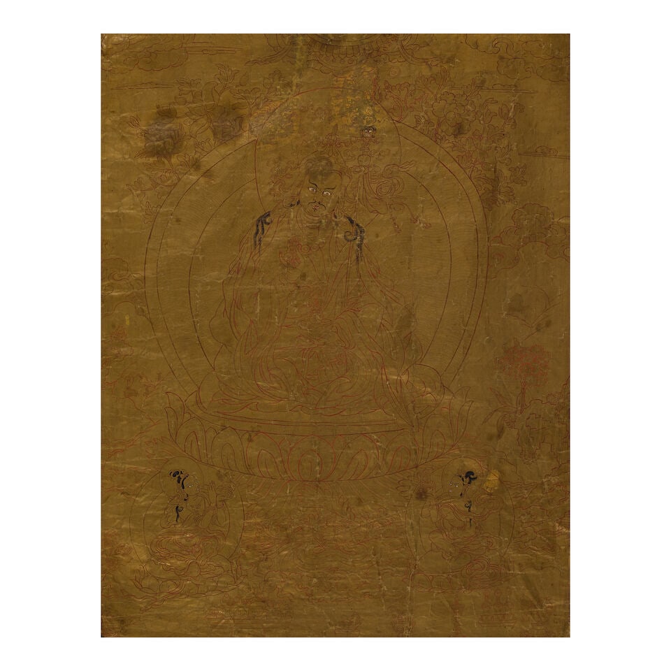 A GOLDGROUND THANGKA OF PADMASAMBHAVA TIBET, 19TH CENTURY: A GOLDGROUND THANGKA OF PADMASAMBHAVA TIBET, 19TH CENTURY Distemper on cloth; rendered on a gold ground with very fine lines of red, black, and gold pigment, Padmasambhava with a peaceful attitude acc