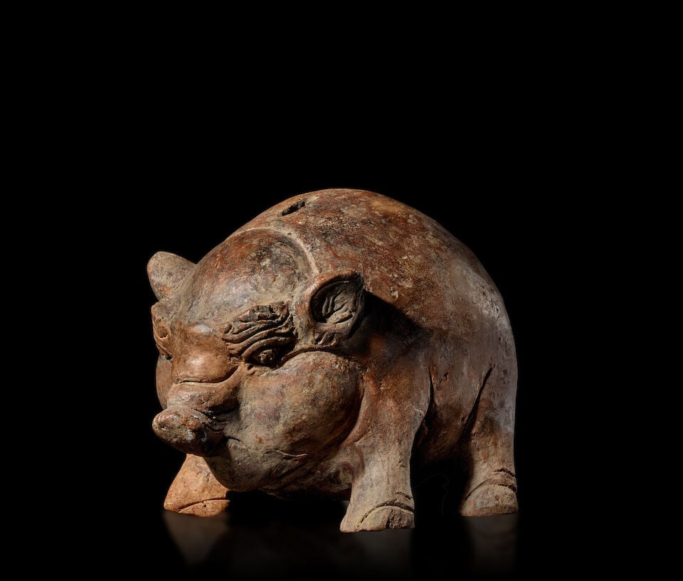 A TERRACOTTA BOAR-SHAPED MONEY BOX INDONESIA, EASTERN JAVA, MAJAPAHIT KINGDOM, 15TH CENTURY - 2