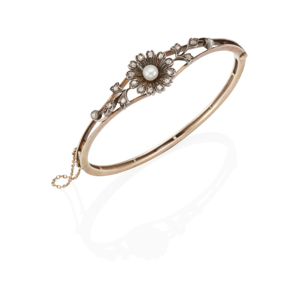 ANTIQUE GOLD, SILVER, DIAMONDS AND CULTURED PEARL BRACELET: ANTIQUE GOLD, SILVER, DIAMONDS AND CULTURED PEARL BRACELET • Silver, 8k yellow gold • Numerous rose-cut diamonds • 1 near-round cultured pearl 5.24mm • Inner circumference 6 1/