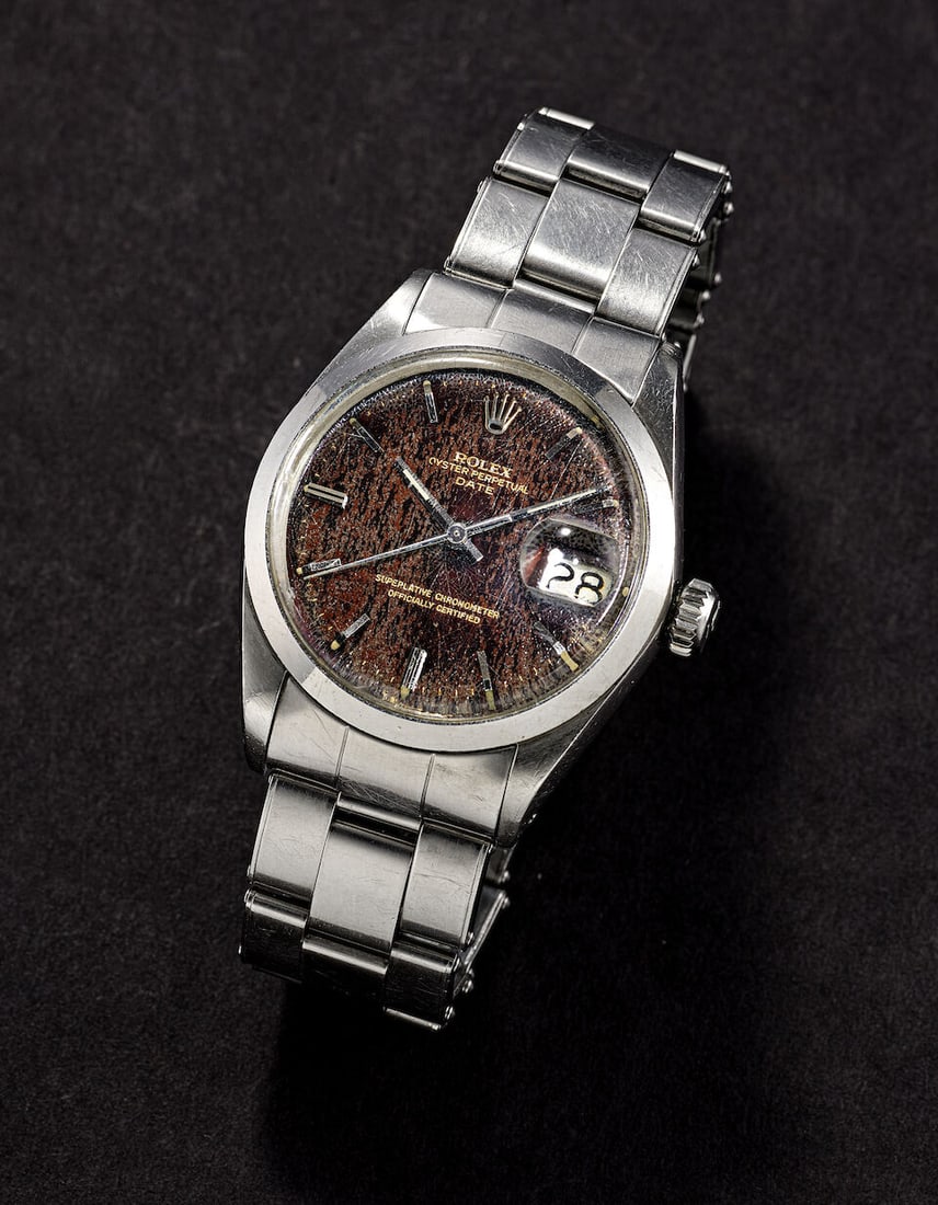 [NO RESERVE] ROLEX | OYSTER PERPETUAL DATE, REF.1500, A STAINLESS STEEL BRACELET WATCH WITH DATE...: [NO RESERVE] ROLEX | OYSTER PERPETUAL DATE, REF.1500, A STAINLESS STEEL BRACELET WATCH WITH DATE AND TROPICAL GILT DIAL, CIRCA 1969 Case No: 2117158 Calibre: 1570, automatic, signed Dial: Tropical