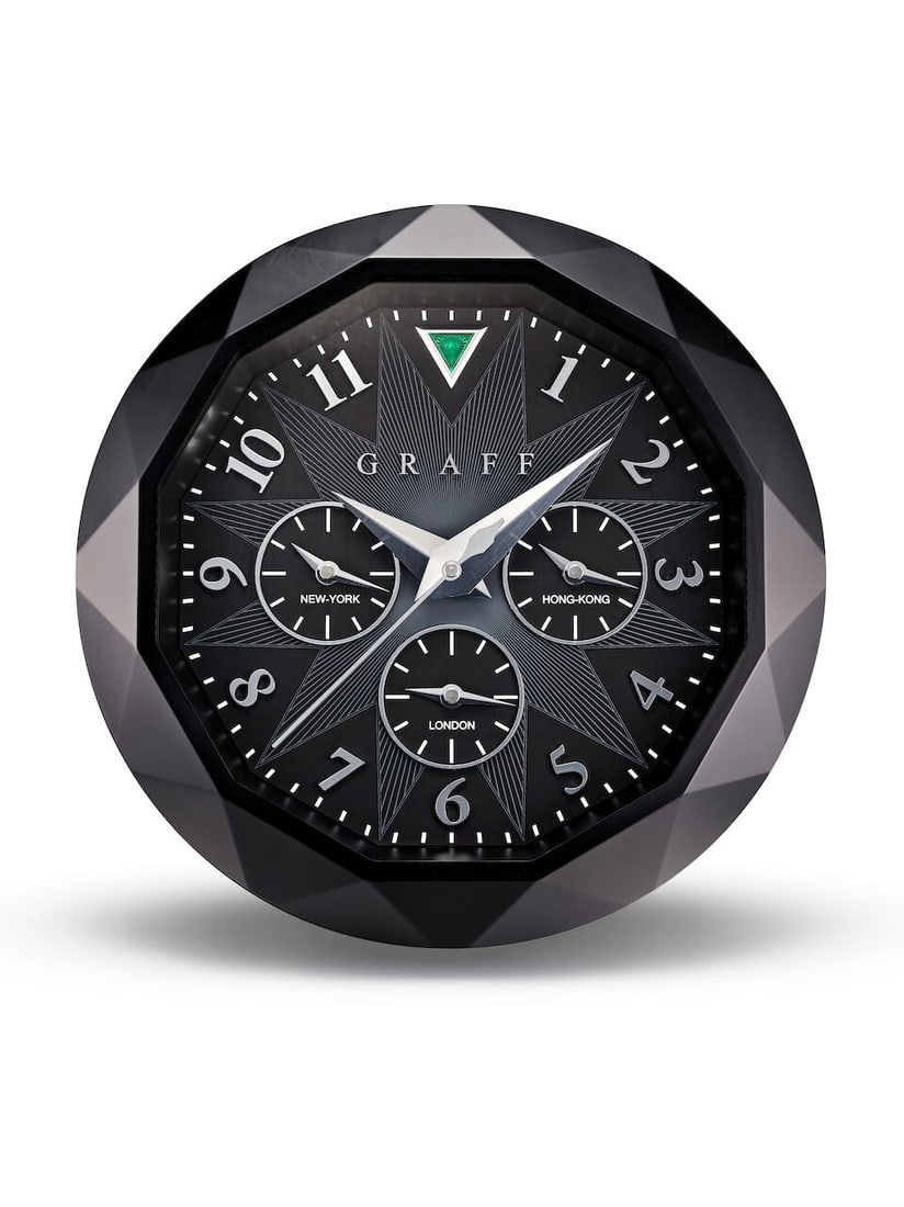 GRAFF | A NEW OLD STOCK FOUR TIME ZONES WALL CLOCK ABS BLACK DIAL, CIRCA 2015: GRAFF | A NEW OLD STOCK FOUR TIME ZONES WALL CLOCK ABS BLACK DIAL, CIRCA 2015 Calibre: Quartz Dial: Black ABS resin, signed Case: 42 x 42cm, Resin, secured by six screws Accompaniments: None Graff | &