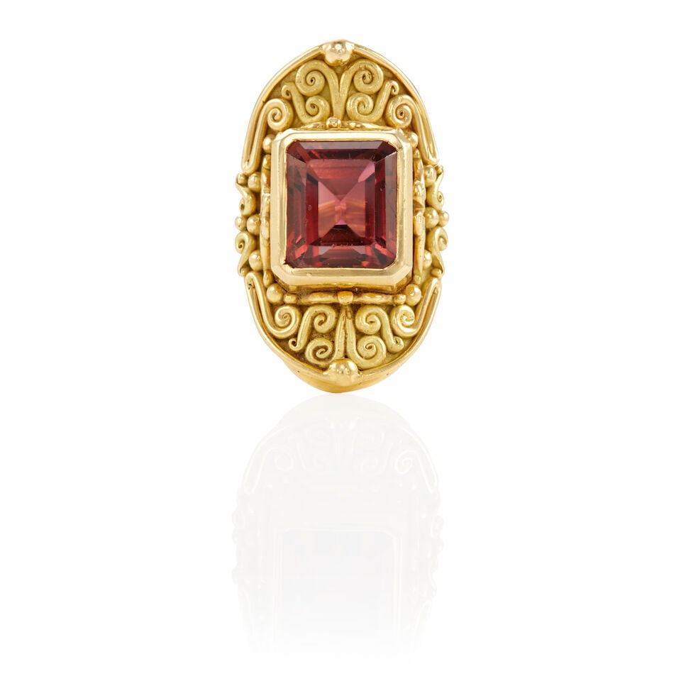 DENISE ROBERGE: 18K GOLD AND TOURMALINE RING: DENISE ROBERGE: 18K GOLD AND TOURMALINE RING • 18k yellow gold • 1 rectangular shape tourmaline weighing approximately 11.15 - 11.20 carats total (13.50 x 11.52 x 9.40 mm) • Signed '