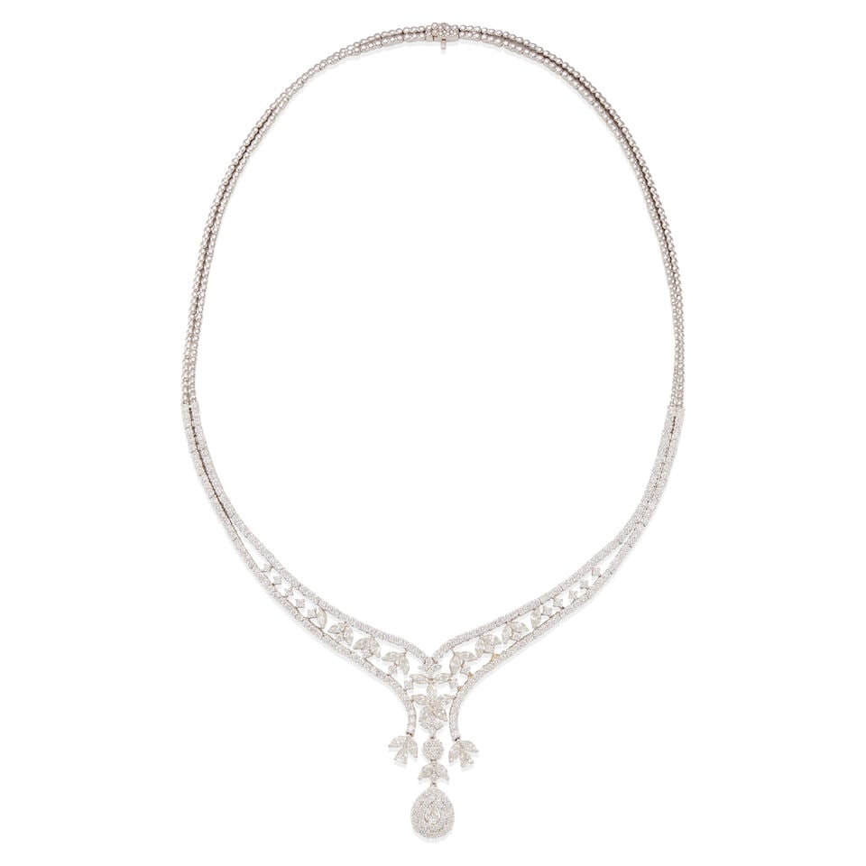 18K GOLD AND DIAMOND NECKLACE: 18K GOLD AND DIAMOND NECKLACE • 18k white gold • Numerous round, marquise and pear-shaped diamonds weighing approximately 4.55 - 4.65 carats total • Length 15 in. • Estimated
