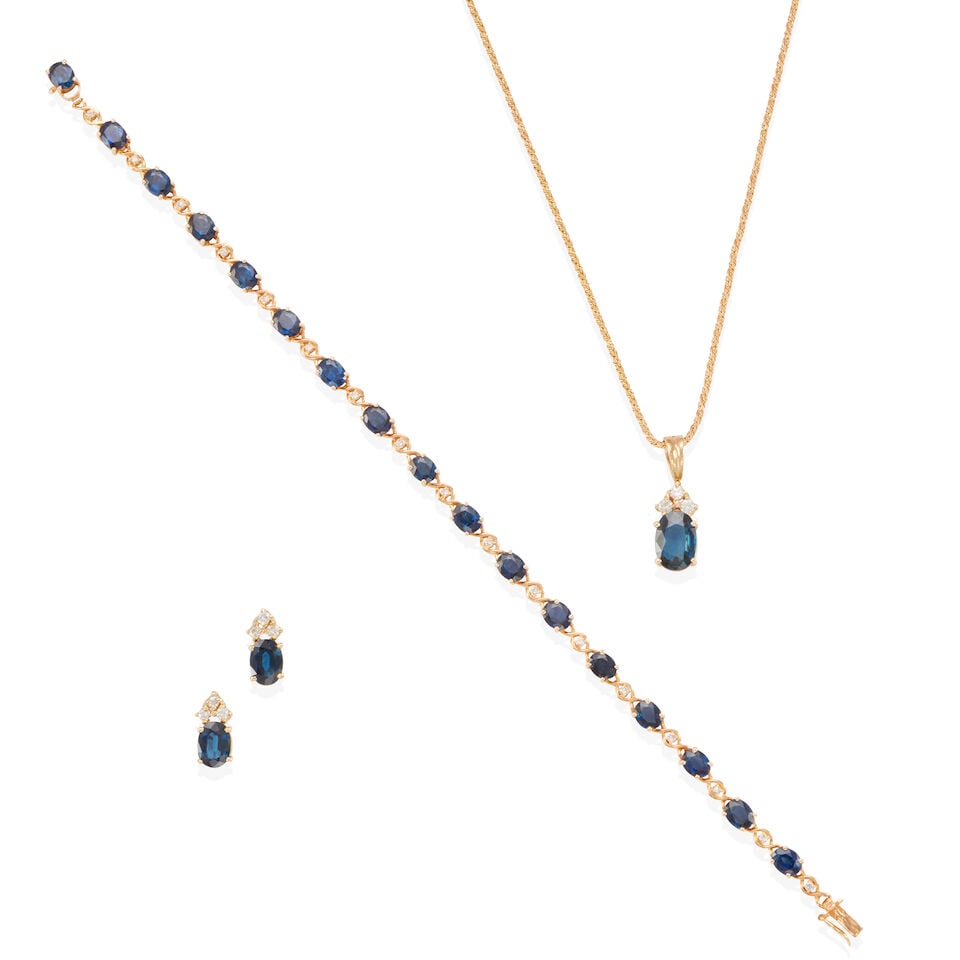 14K GOLD, DIAMOND AND SAPPHIRE SUITE: 14K GOLD, DIAMOND AND SAPPHIRE SUITE • One bracelet of 14k yellow gold with 17 oval sapphires weighing approximately 5.90 - 6.00 carats total and 17 round diamonds weighing approximately 0.10 -