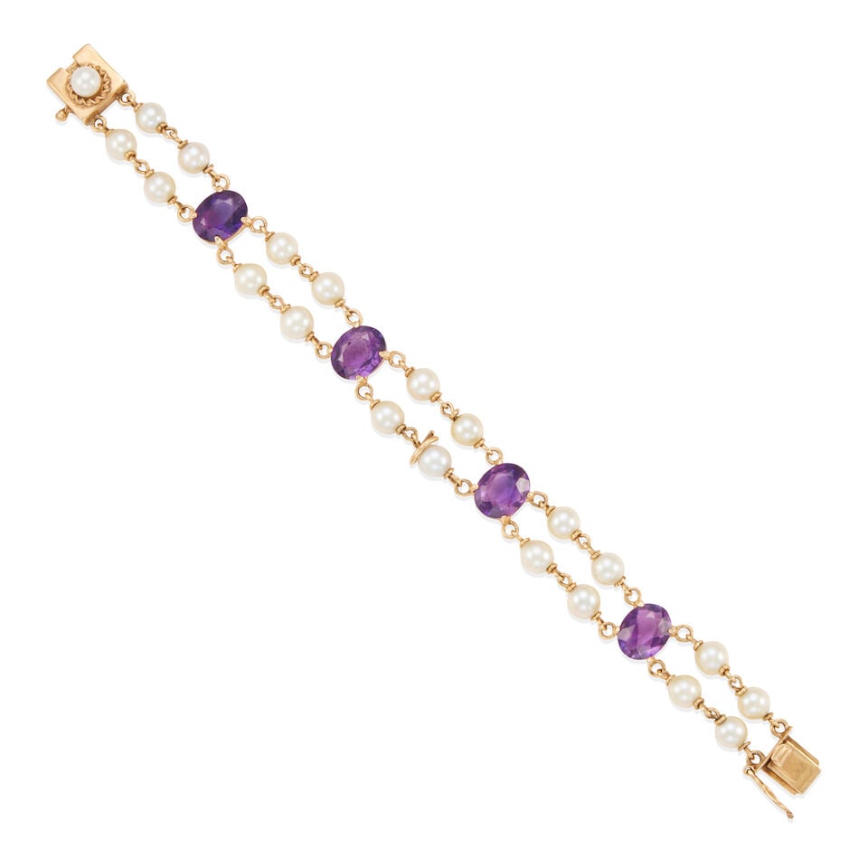 14K GOLD, CULTURED PEARL, AND AMETHYST BRACELET: 14K GOLD, CULTURED PEARL, AND AMETHYST BRACELET • 14k yellow gold • 20 spherical drilled and 1 spherical half-drilled Saltwater cultured pearls measuring 5.15 mm to 5.70 mm each in