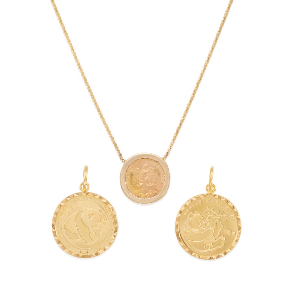 THREE GOLD COIN JEWELRY: THREE GOLD COIN JEWELRY • One pendant of 18k yellow gold on a 14k yellow gold chain, length 15 1/4 in. • 2 coins pendants of 24k yellow gold, measure 3/4 x 3/4 in., estimated weight 8.0