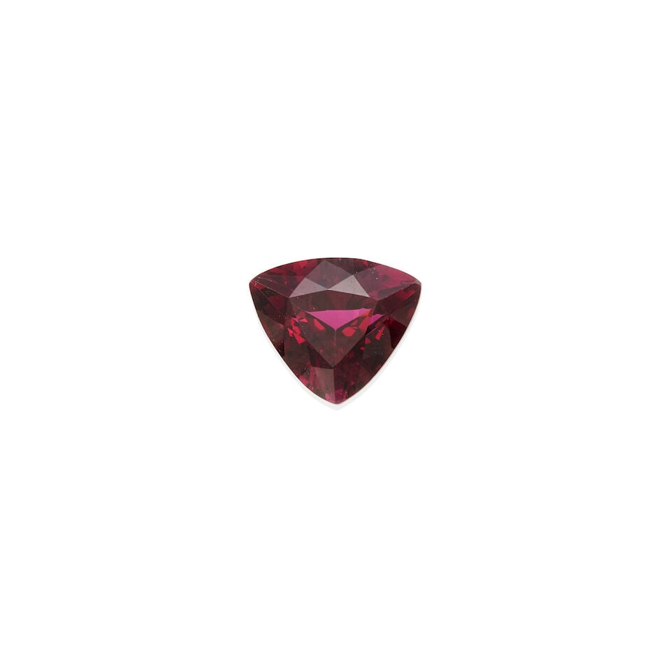 ONE LOOSE RHODOLITE GARNET WITH GIA REPORT: ONE LOOSE RHODOLITE GARNET WITH GIA REPORT • One triangle shape modified brilliant rhodolite garnet weighing 5.50 carats • Accompanied by GIA Identification Report #6233790660 dated