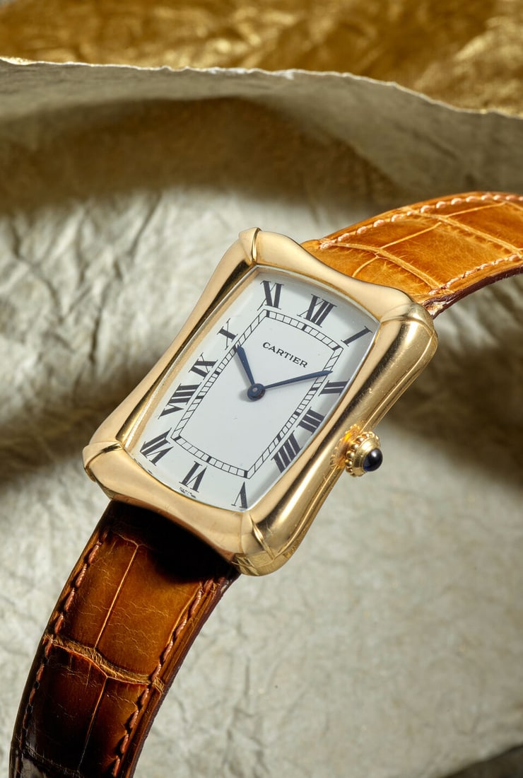 CARTIER. A FINE AND RARE 18K GOLD MANUAL WIND WRISTWATCH 'Bamboo' Coussin, c. 1970s (1 of 4)