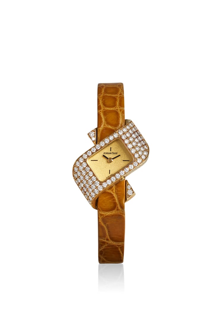 AUDEMARS PIGUET. AN 18K GOLD AND DIAMOND SET QUARTZ WRISTWATCHc. 1990s - 2