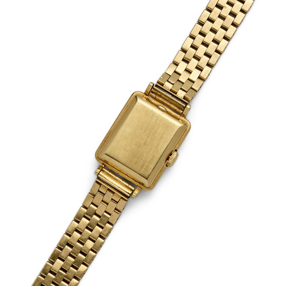 PATEK PHILIPPE. AN 18K GOLD MANUAL WIND BRACELET WATCHRef: 2213, c. 1950s - 2
