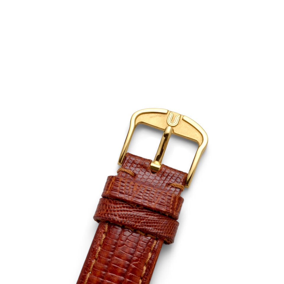 UNIVERSAL GENÈVE. AN 18K GOLD MANUAL WIND CHRONOGRAPH WRISTWATCH Compax, Ref: 124107, c. 1950s - 2