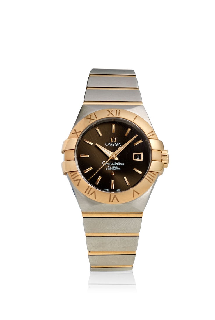 OMEGA. A STAINLESS STEEL AND 18K ROSE GOLD AUTOMATIC CALENDAR BRACELET WATCH Constellation, Ref... (1 of 2)