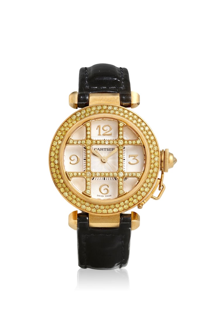 CARTIER. AN 18K GOLD AND COLORED DIAMOND SET AUTOMATIC CALENDAR WRISTWATCH Pasha Grille, Ref: 23...: CARTIER. AN 18K GOLD AND COLORED DIAMOND SET AUTOMATIC CALENDAR WRISTWATCH Model: Pasha Grille Reference: 2399 Date: c. 2000s Movement: Cal. 120, 20-jewel automatic Dial: Silvered Case: Round, diamond
