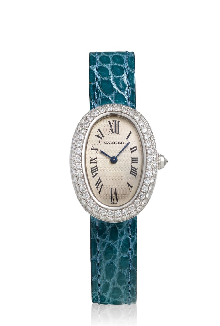 CARTIER. A FINE 18K WHITE GOLD AND DIAMOND SET QUARTZ WRISTWATCH Baignoire, Ref: 1955, c. 2000s (1 of 2)