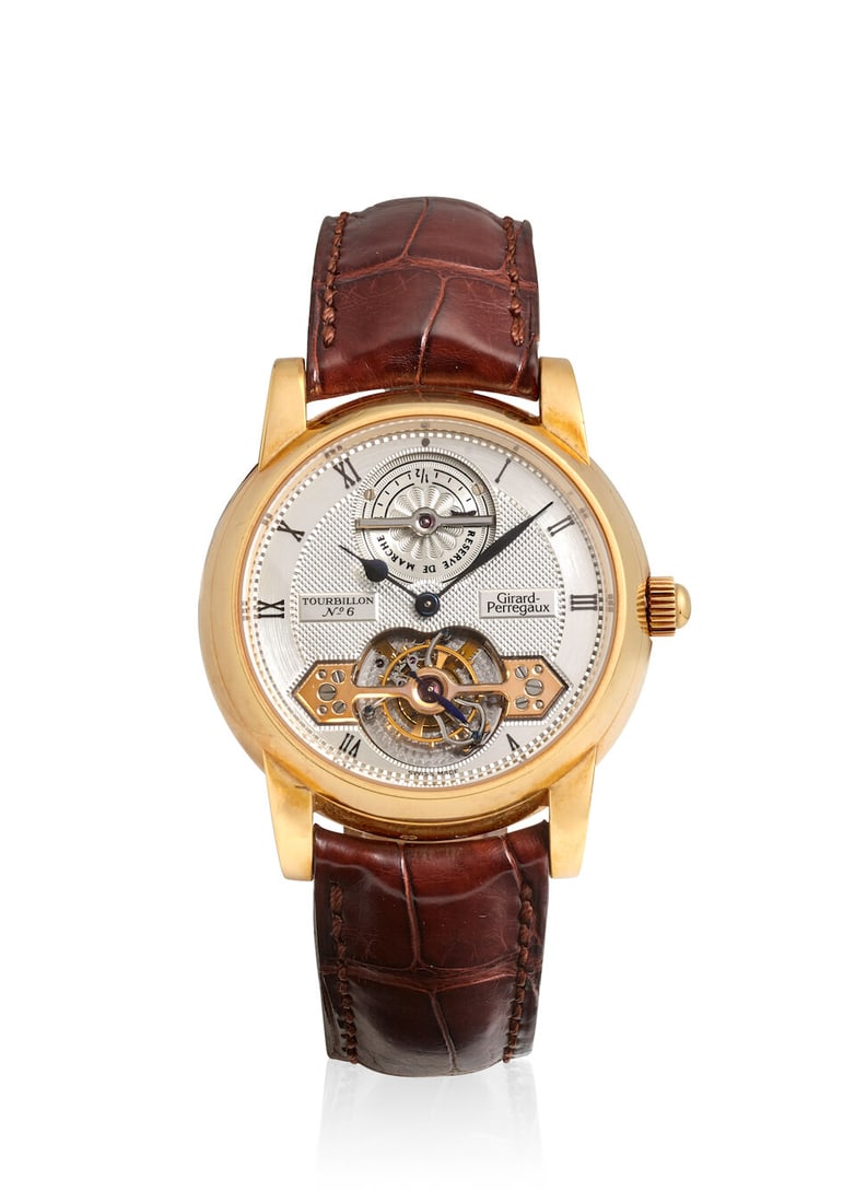 GIRARD-PERREGAUX. A FINE 18K GOLD MANUAL WIND TOURBILLON WRISTWATCH WITH POWER RESERVE INDICATIO... (1 of 3)
