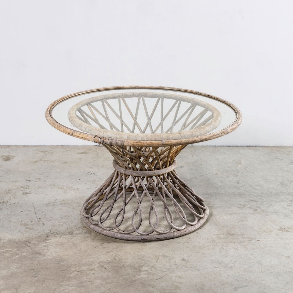 LOUIS SOGNOT (1892-1972) Rare table circulaire: LOUIS SOGNOT (1892-1972) Rare table circulaire Circa 1955 Réalisation Établissements Chevallier Rotin et verre H: 48,5 cm. (19 in.); D: 84 cm. (33 in.) A rare circular table in rattan and gl