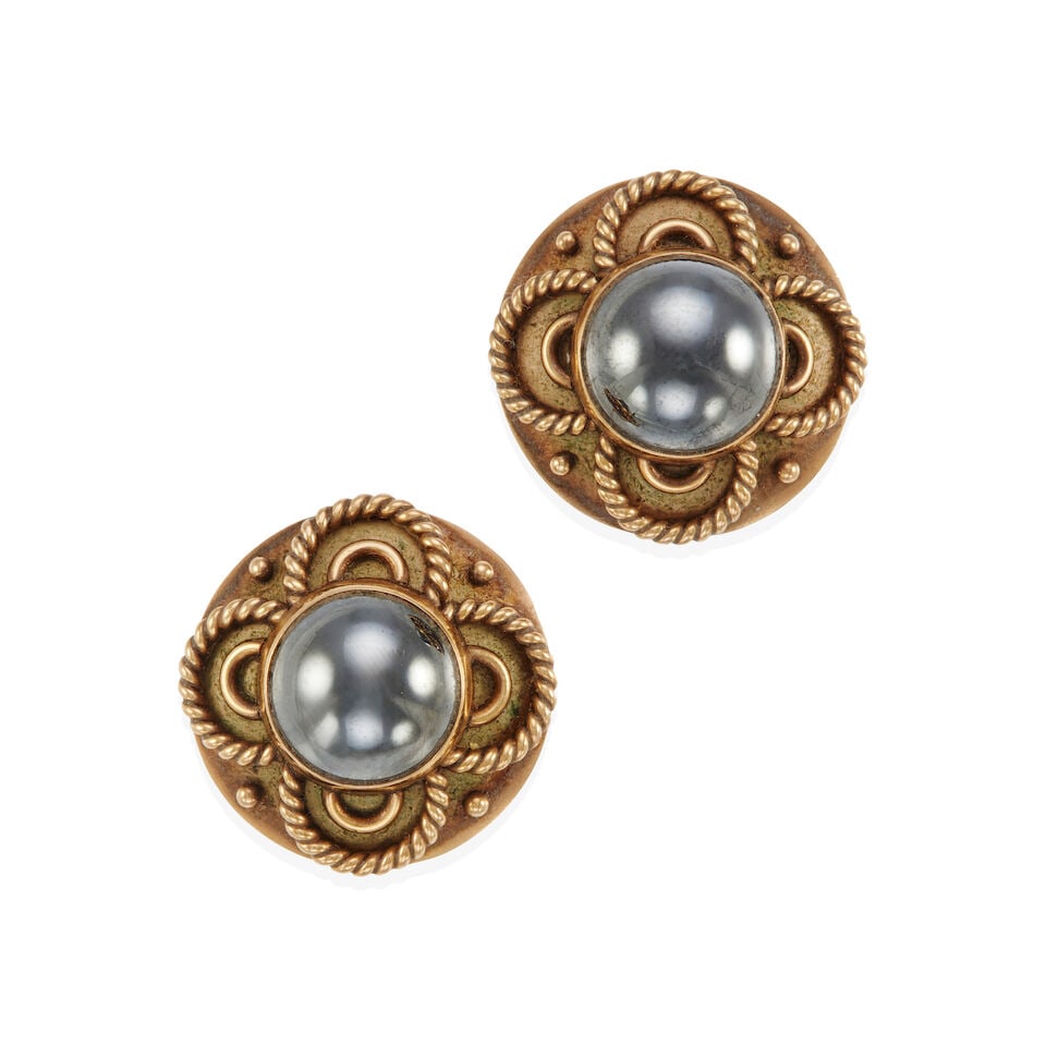 PAIR OF 9K GOLD AND HEMATITE EARRINGS: PAIR OF 9K GOLD AND HEMATITE EARRINGS • 9k yellow gold • 2 half-sphere hematite 13.86 - 14.06mm • Maker's mark • Measures 1 x 1 in. • Estimated gross weight: 22.5