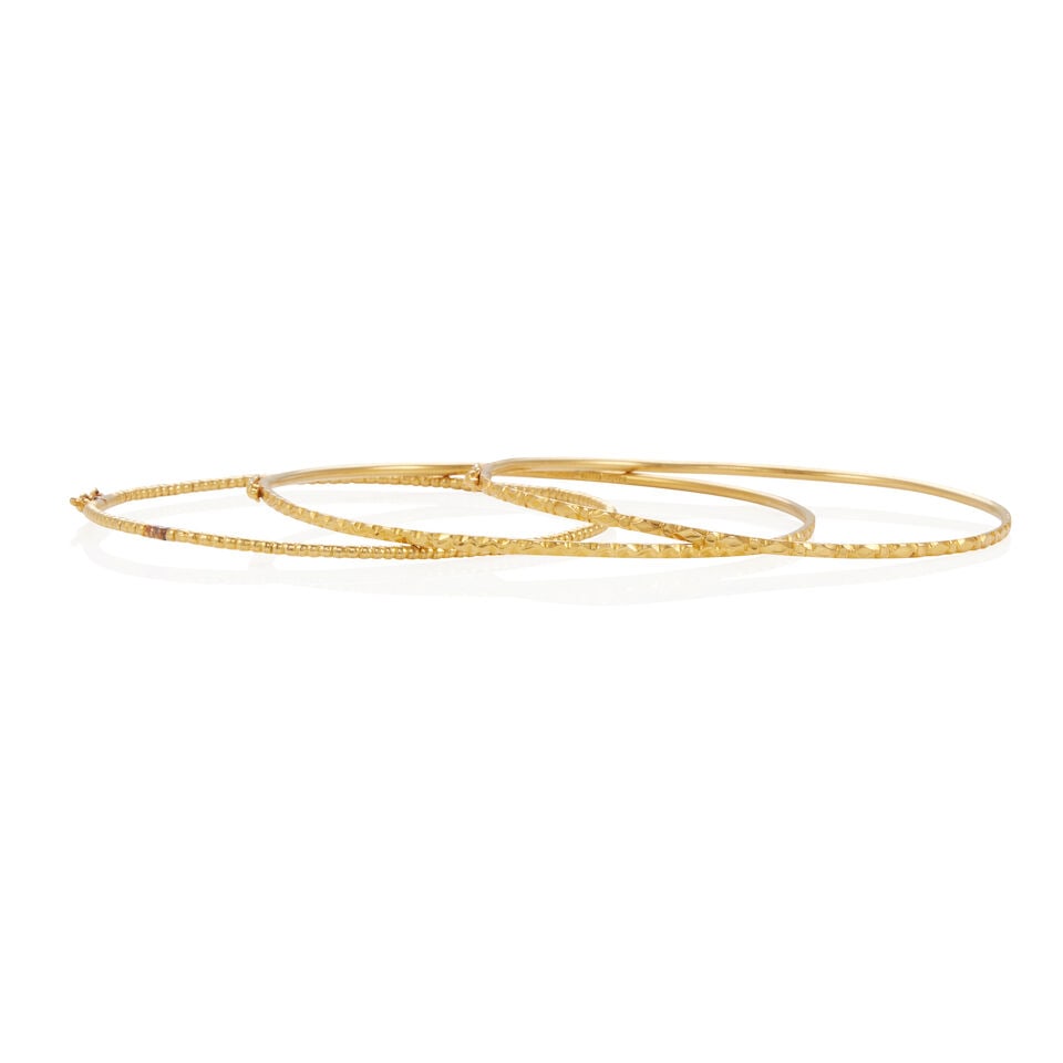 THREE 20K GOLD BANGLE BRACELETS - 2
