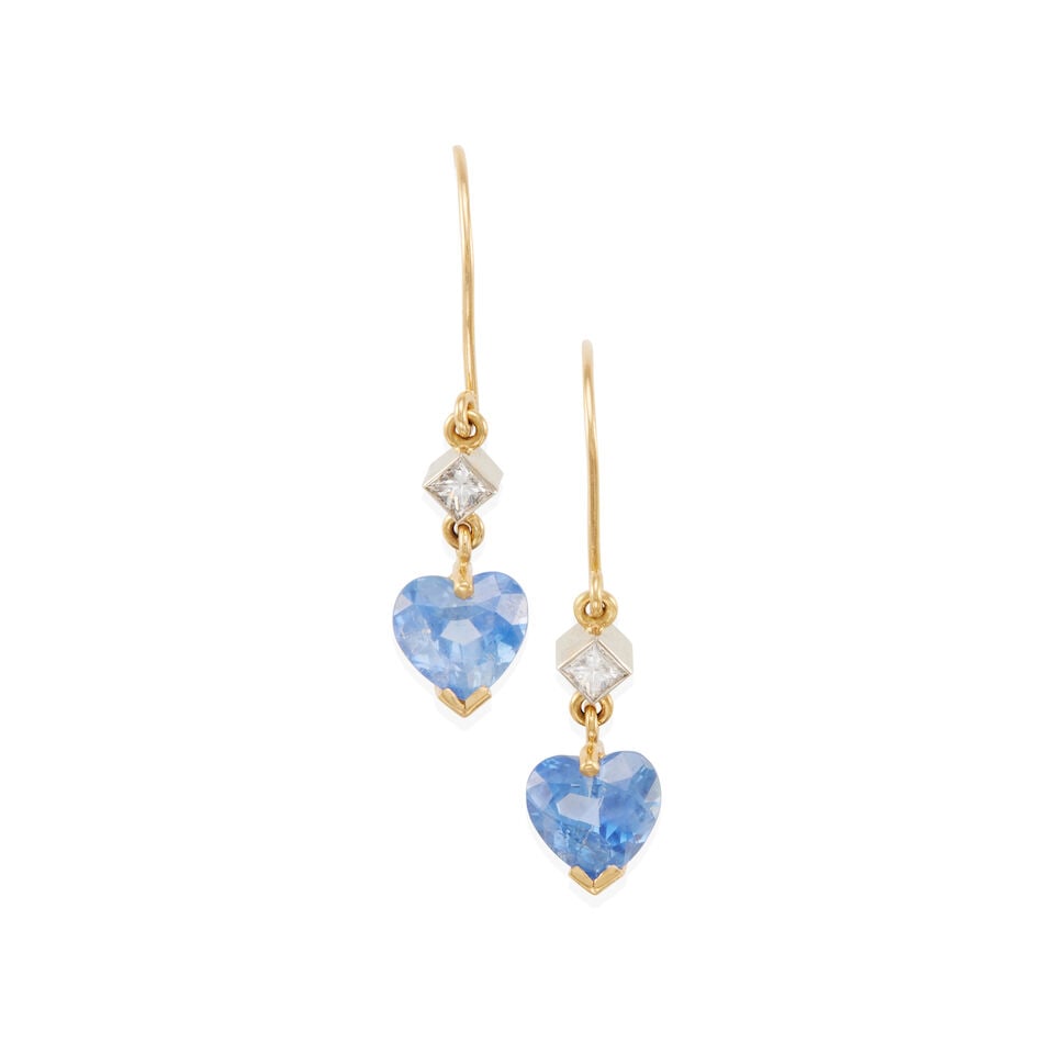 18K BICOLOR GOLD, SAPPHIRE, AND DIAMOND EARRINGS: 18K BICOLOR GOLD, SAPPHIRE, AND DIAMOND EARRINGS • 18k yellow and white gold • 2 heart shaped sapphires weighing approximately 5.30 - 5.40 carats total • 2 square shaped diamonds