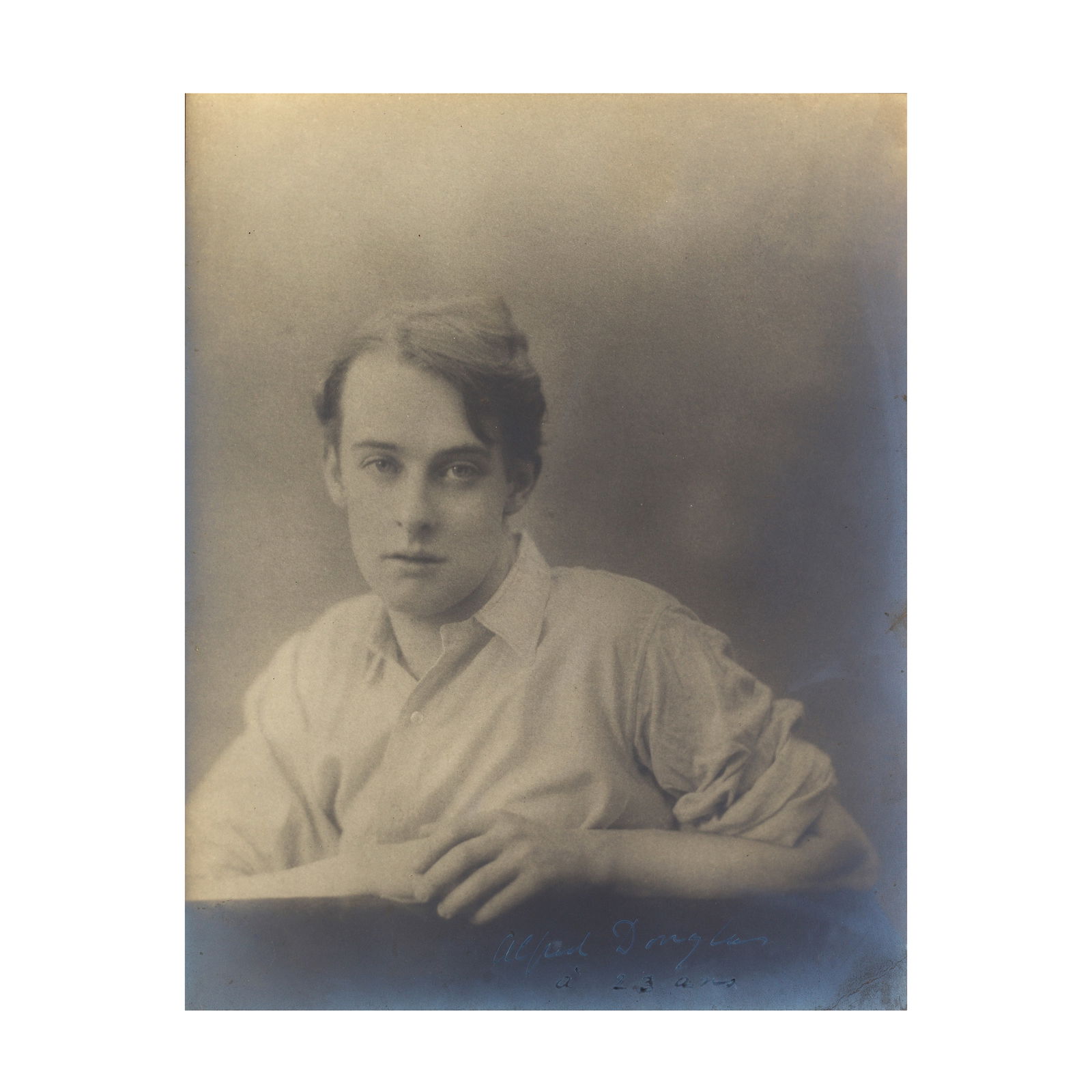 DOUGLAS (LORD ALFRED) Portrait photograph of Lord Alfred Douglas, by Cameron Studio, SIGNED BY T...: DOUGLAS (LORD ALFRED) Portrait photograph of Lord Alfred Douglas, by Cameron Studio, SIGNED BY THE SITTER ('Alfred Douglas', and in a different hand 'à 23 ans') on the image, platinum print, mou