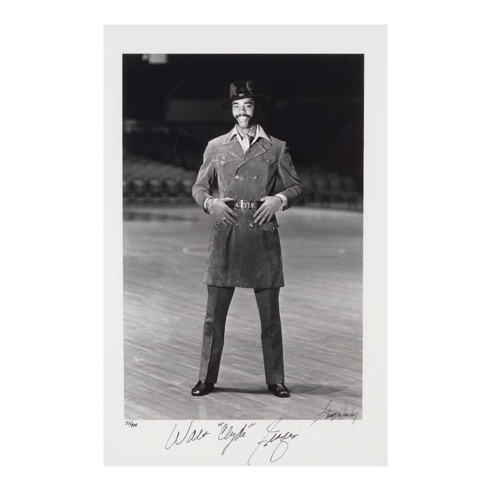George Kalinsky (1936-2025): Walt 'Clyde' Frazier: George Kalinsky (1936-2025): Walt 'Clyde' Frazier signed George Kalinsky, titled, and numbered 52/100 (lower margin) black and white photograph sight 18 3/8 x 12 3/8in; framed 30 x 22 1/2in Together w