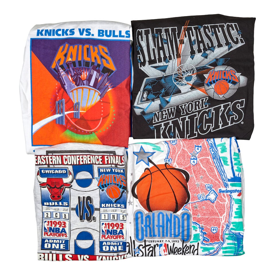 A Group of New York Knicks All-Star Game and Playoffs Material1990s: A Group of New York Knicks All-Star Game and Playoffs Material 1990s comprising seven t-shirts, thirty-six rally towels, and a 1996 I'M A KNICKS FAN! / CATCH THE RHYTHM Wiz cassette. (44) Footnotes: C