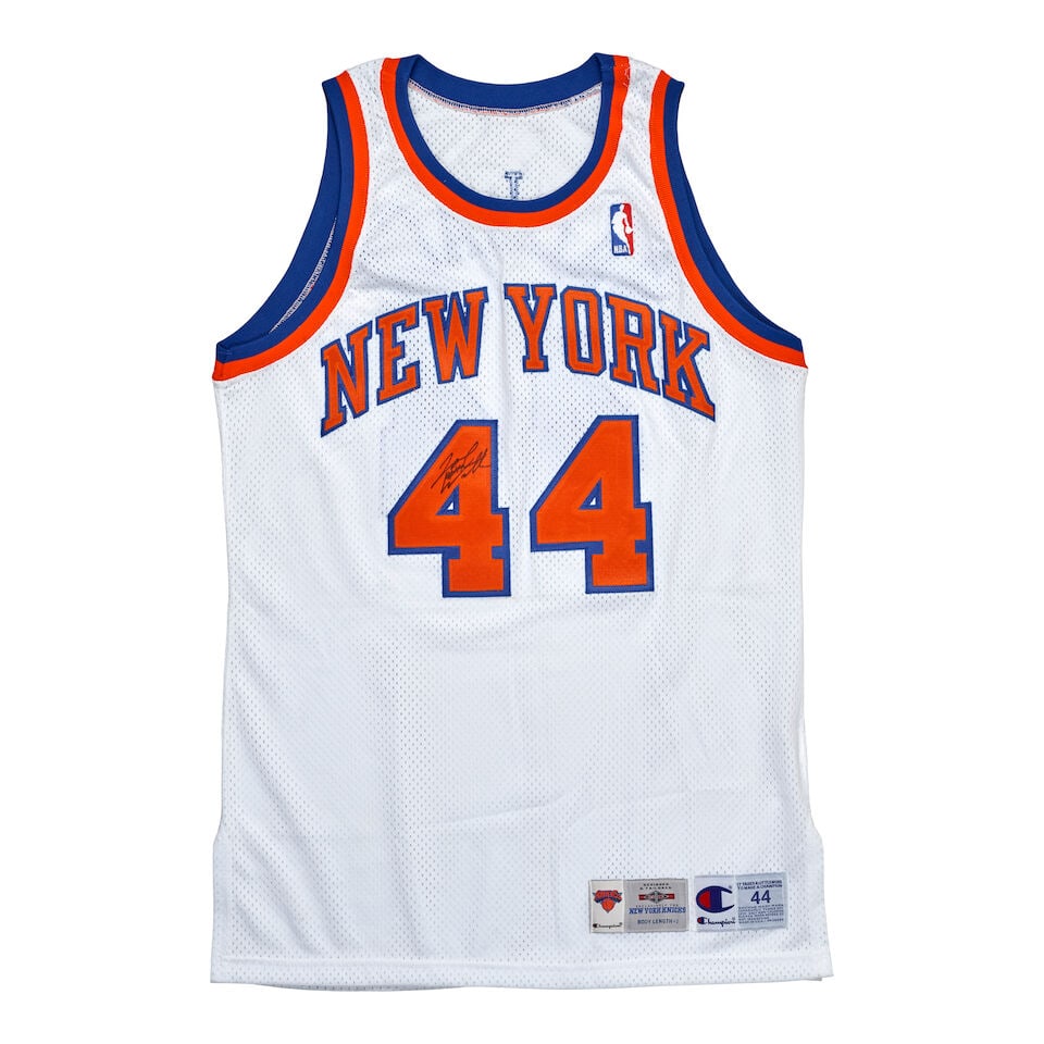 Seven Signed Basketball Jerseys: Seven Signed Basketball Jerseys comprising five New York Knicks jerseys, each individually signed, including by Brandon Williams, Marcus Camby, Patrick Ewing, and John Wallace; and by two San Antonio