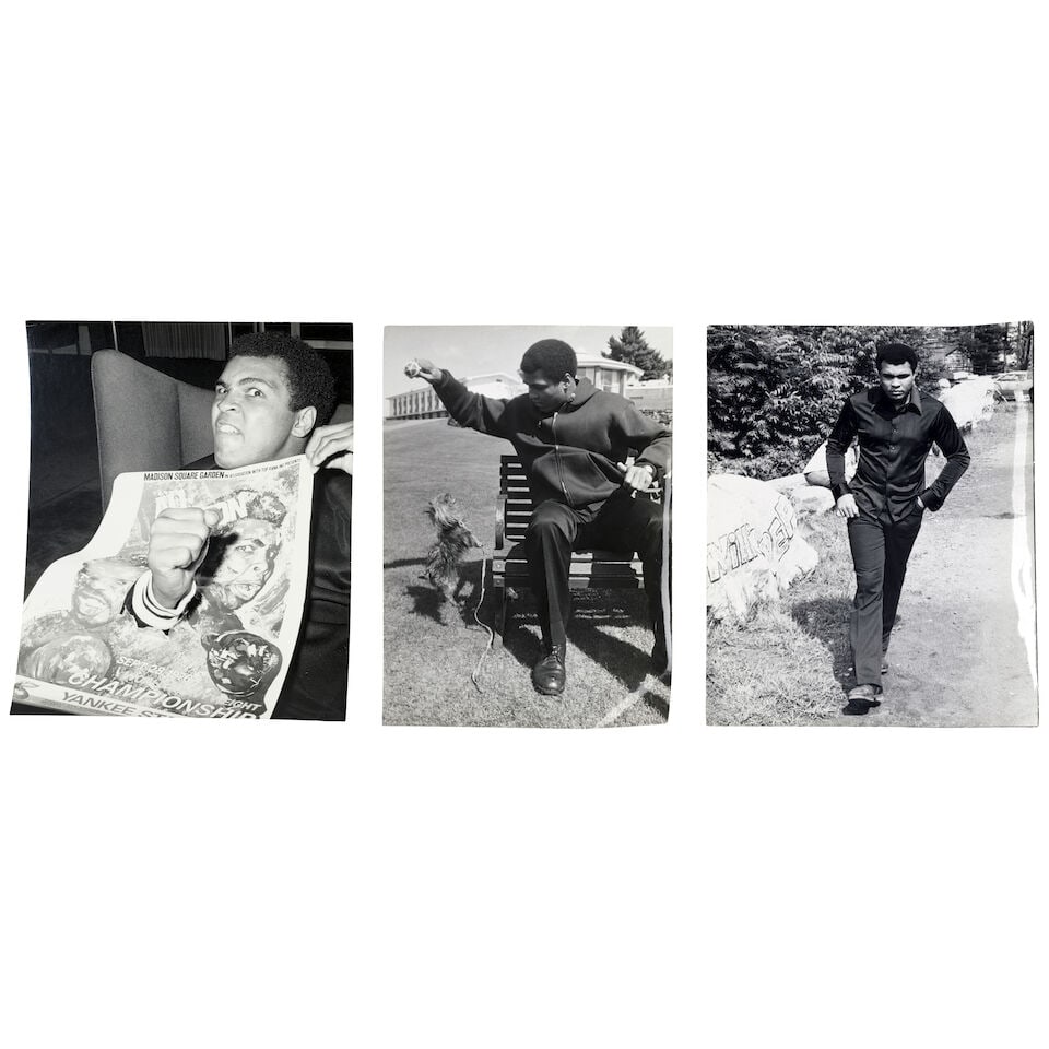 George Kalinsky (1936-2025): Muhammad Ali: Three Photographs: George Kalinsky (1936-2025): Muhammad Ali: Three Photographs comprising Ali holding the 1976 World Heavy Weight Championship Yankee Stadium poster, Ali on a walk outside, and Ali on a bench playing wi
