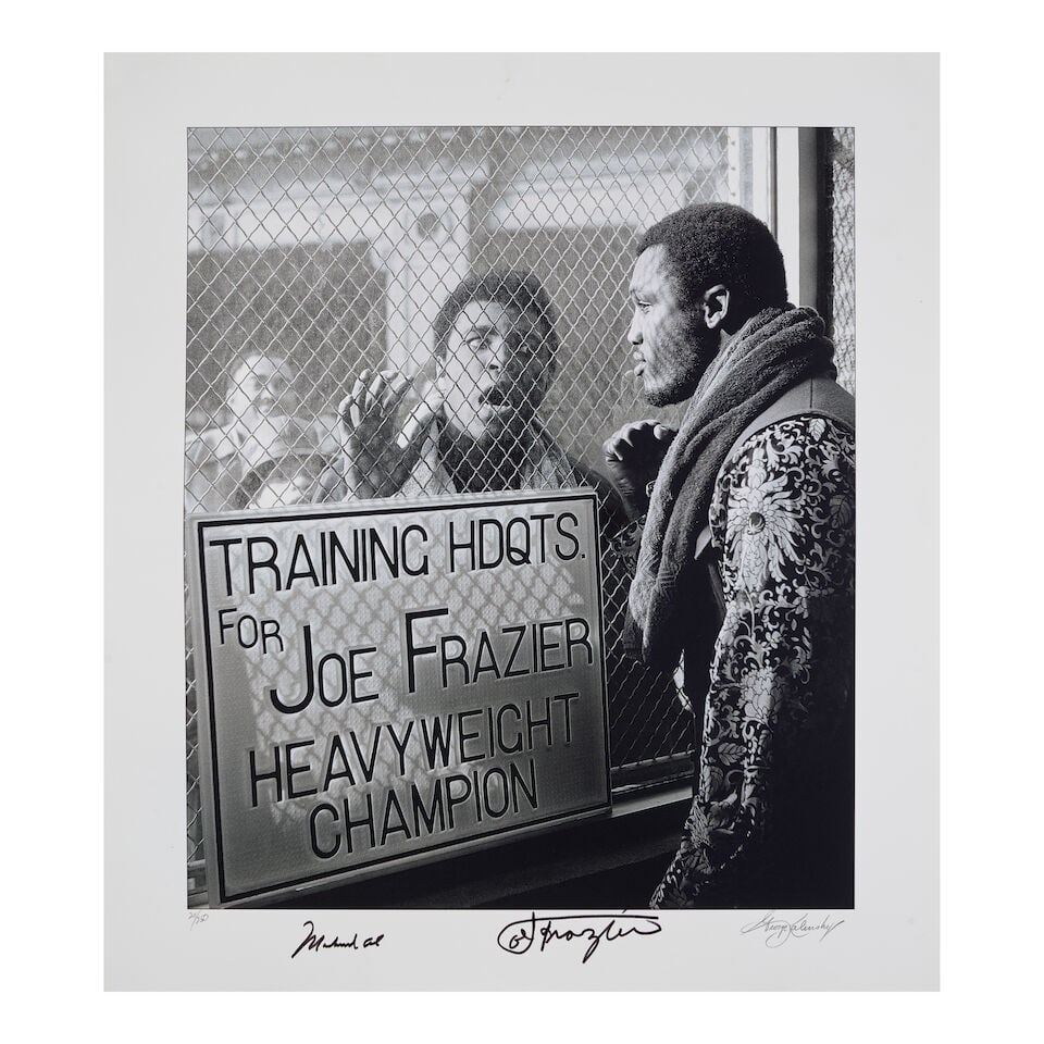 A Group of Fight of the Century Material: A Group of Fight of the Century Material comprising a postcard signed Muhammad Ali and Joe Frazier; a 20th Anniversary gala program signed Muhammad Ali and Joe Frazier, accompanied by George Kalinsky'