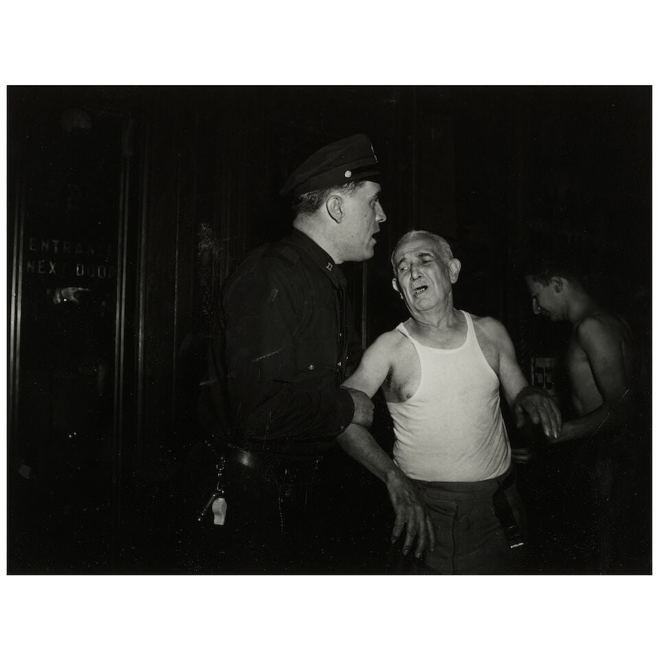 Weegee (Arthur Fellig) (1899-1968); Landlord Crying Over the Loss of His Tobacco Shop in Fire, N... (1 of 2)