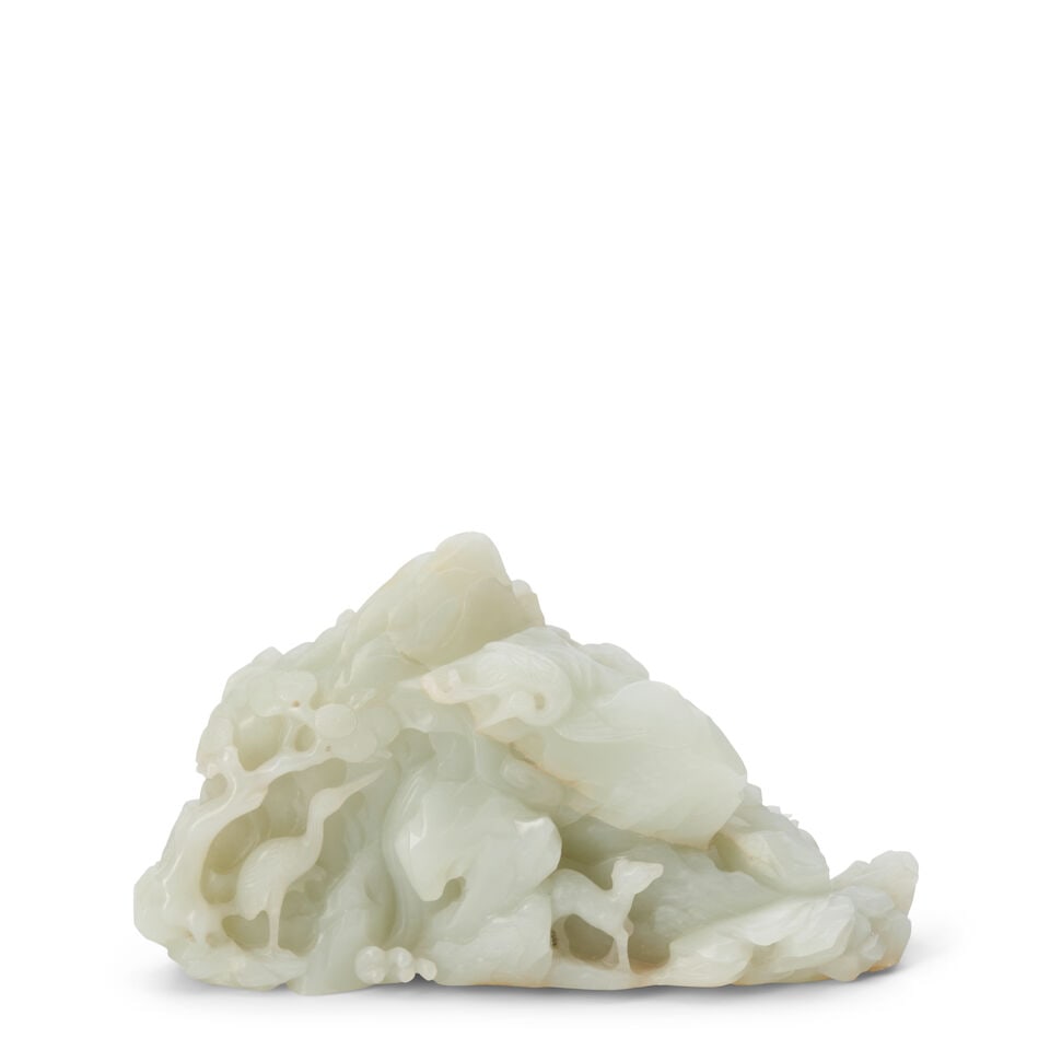 A PALE CELADON AND RUSSET JADE BOULDER 18th/19th century - 2