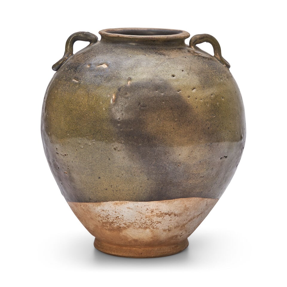 A GREEN-BROWN-GLAZED TWO-HANDLED JAR Tang Dynasty (1 of 3)