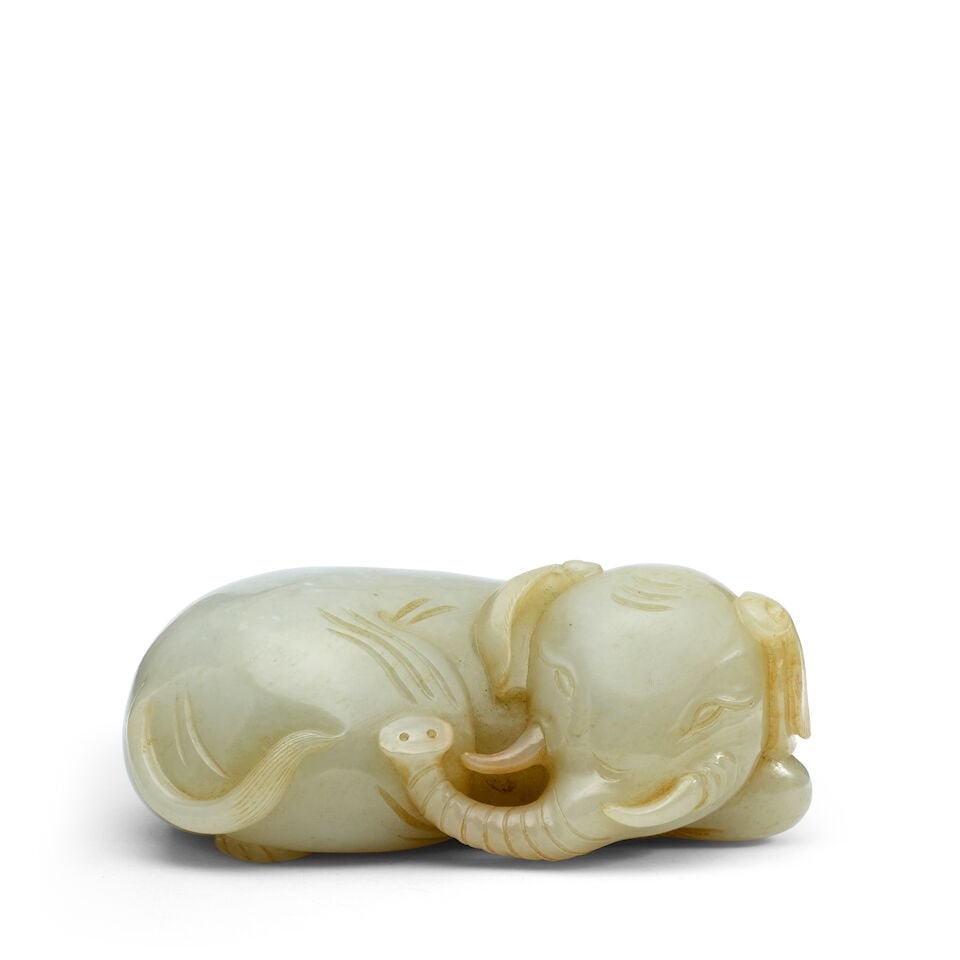 A PALE GREENISH WHITE CARVING OF AN ELEPHANT (wood stand) - 2