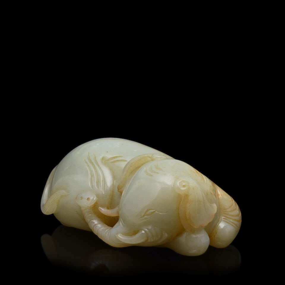 A PALE GREENISH WHITE CARVING OF AN ELEPHANT (wood stand) - 4