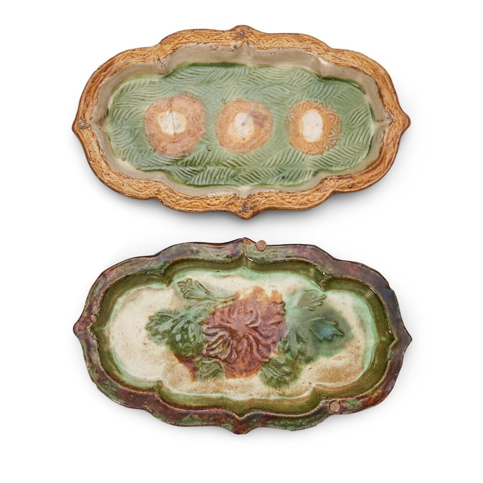 TWO MOLDED SANCAI-GLAZED BRACKET-LOBED OVAL DISHES Liao Dynasty (2): TWO MOLDED SANCAI-GLAZED BRACKET-LOBED OVAL DISHES Liao Dynasty 10 1/4in (26cm) across (2). Footnotes: 遼